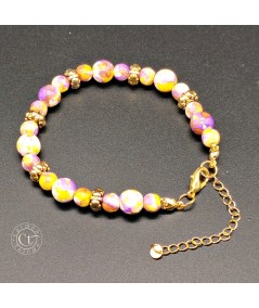 PULSERA DE CERÁMICA MULTICOLOR Y ENTREPIEZAS DORADAS