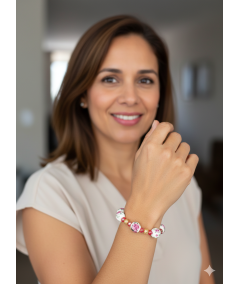 Pulsera dorada de cerámica y cristal rojo